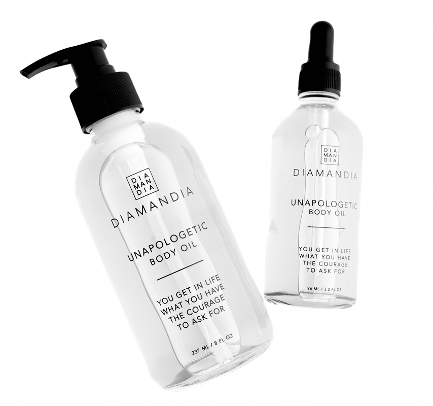 Two bottles of unapologetic body oil.